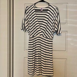 Franchesca's stripped white and navy v-neck dress